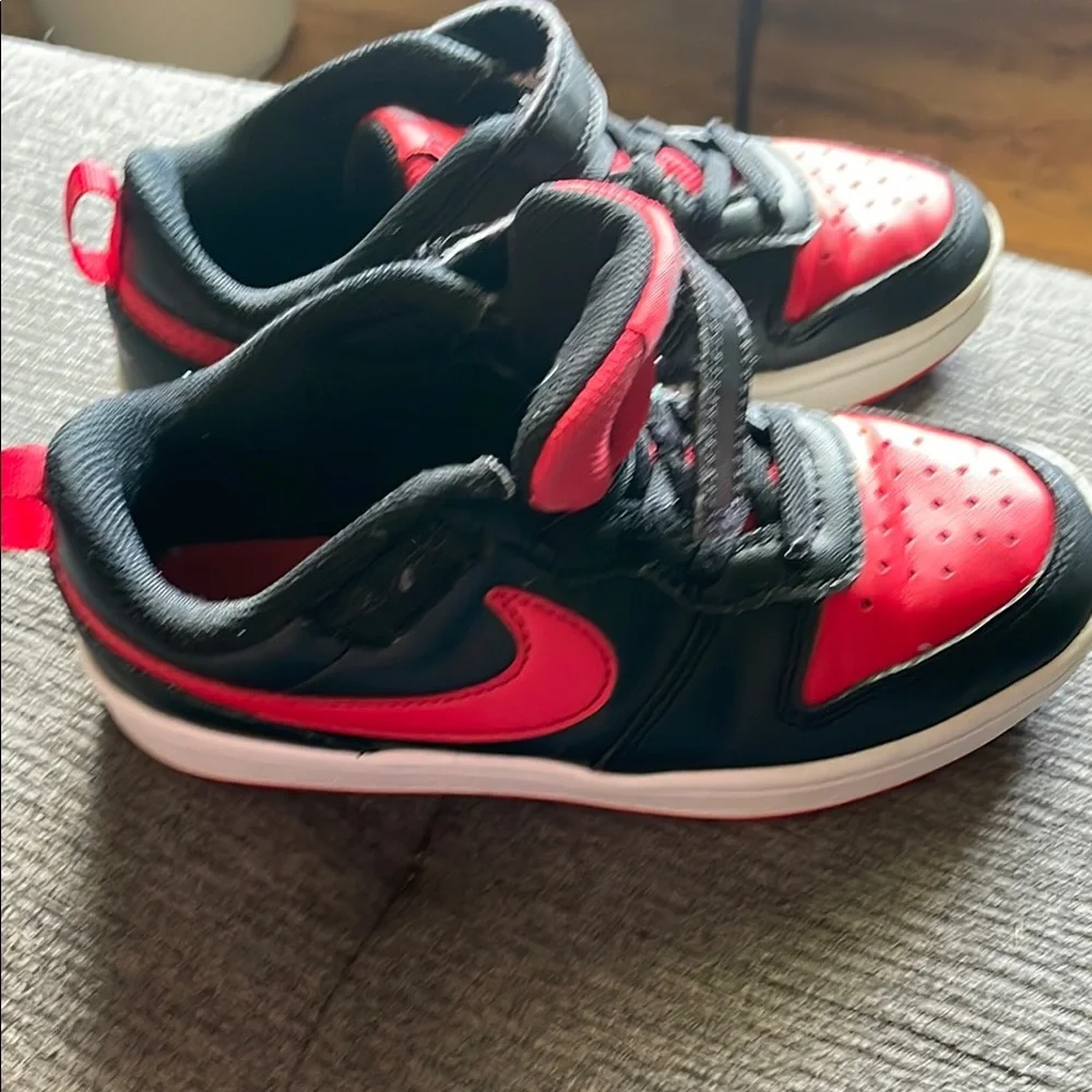Nike Red and Black Sneakers with Classic Style
